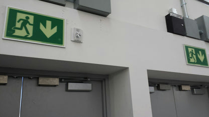 Door Mounted Pathmarking Sign. Running Man with Exit. 3M Double Sided Tape